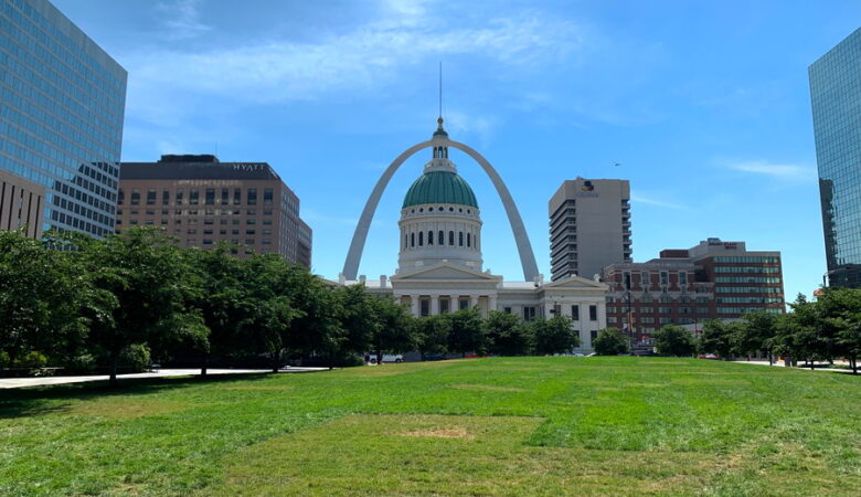 View of St Louis Arch surrounded by city buildings