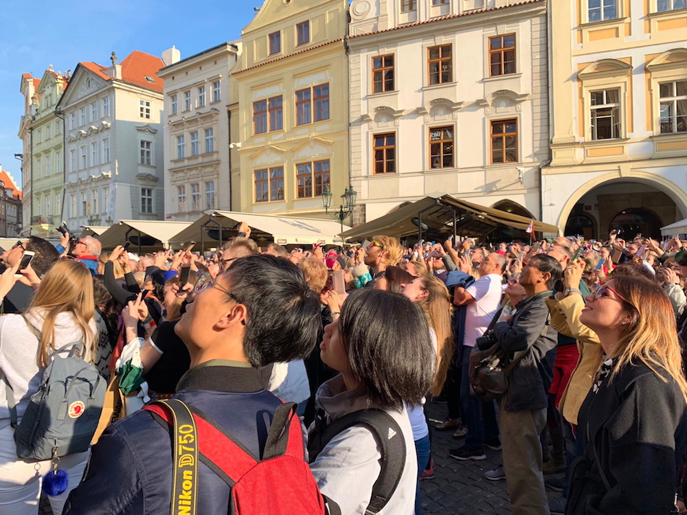 Crowds watching the astronomical clock in Prague