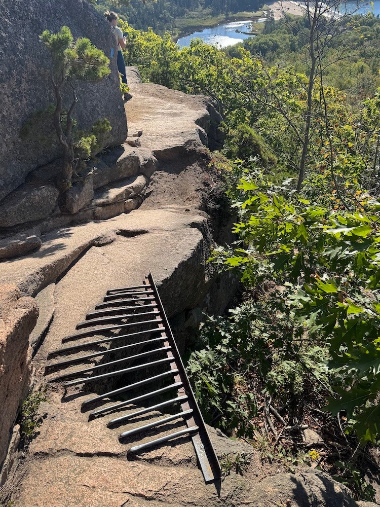 Cliff ledge with metal grate along the Beehive Trail