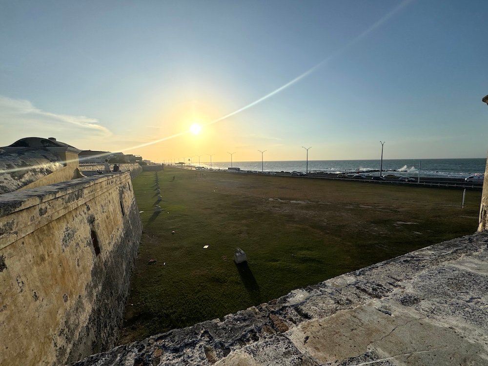 Overlooking the ocean and city walls near sunset in Cartagena