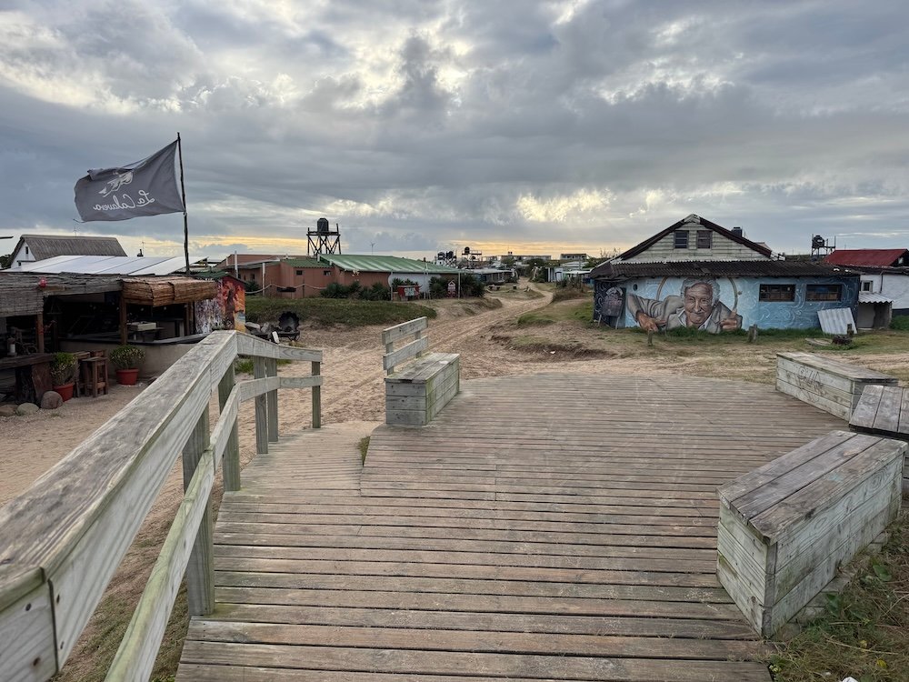 Boardwalk and buildings in the town of Cabo Polonio