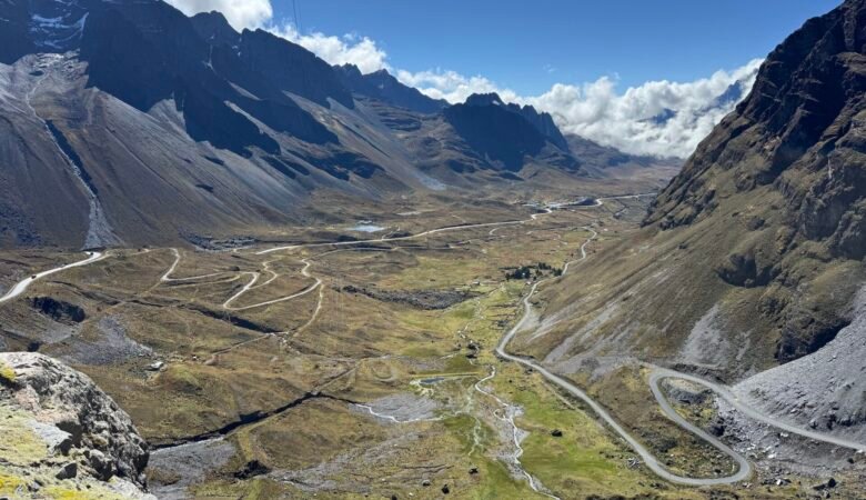 Winding road surrounded by mountains