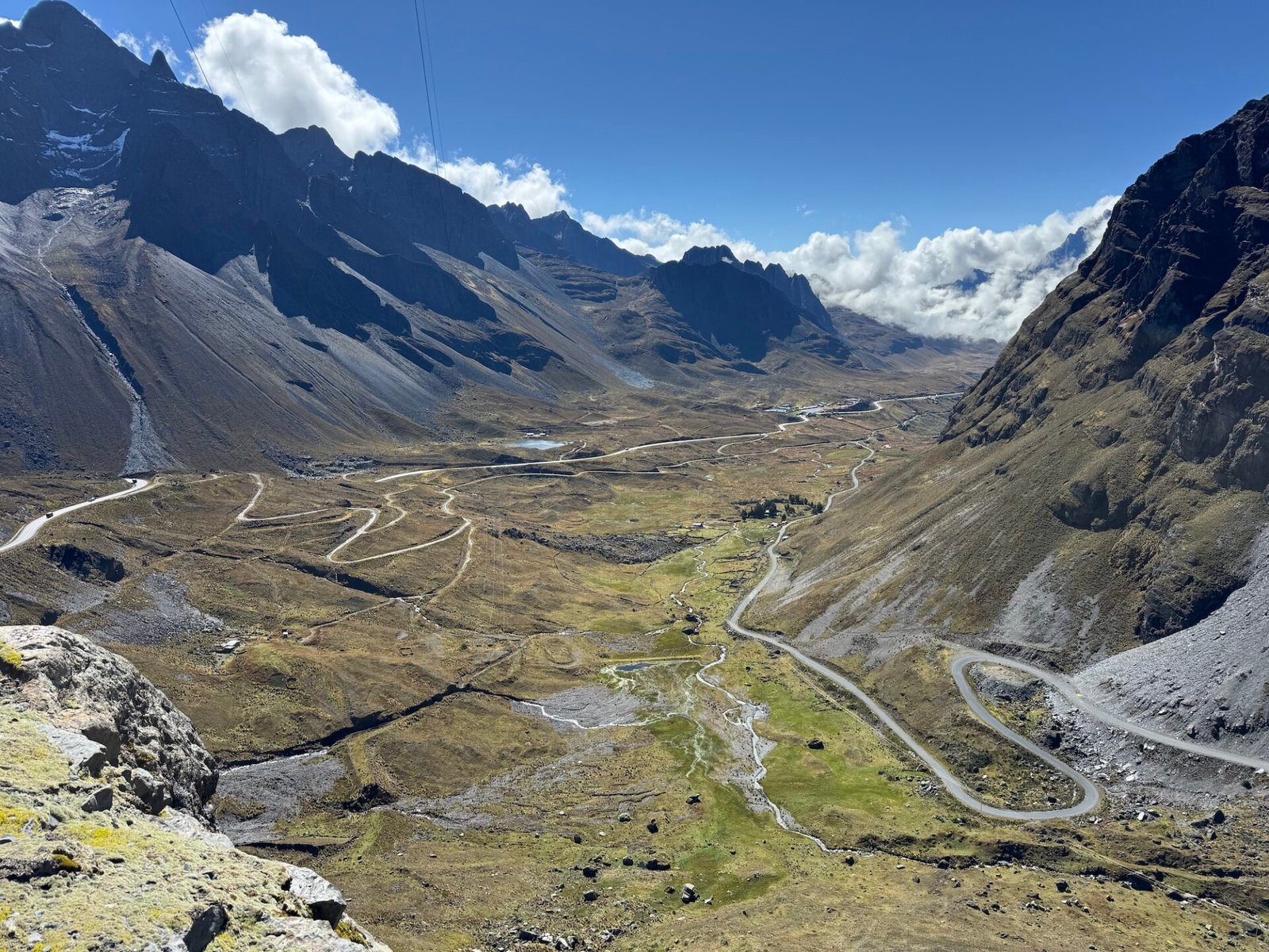 Winding road surrounded by mountains