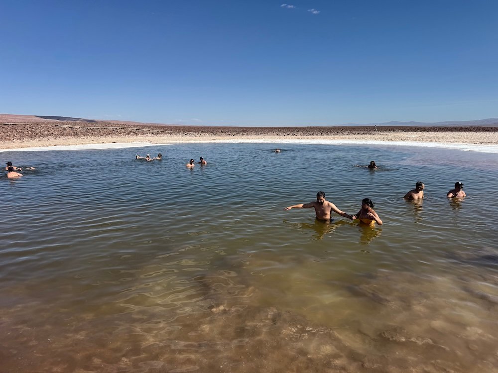 Tourists swimming at Baltinache Lagoons