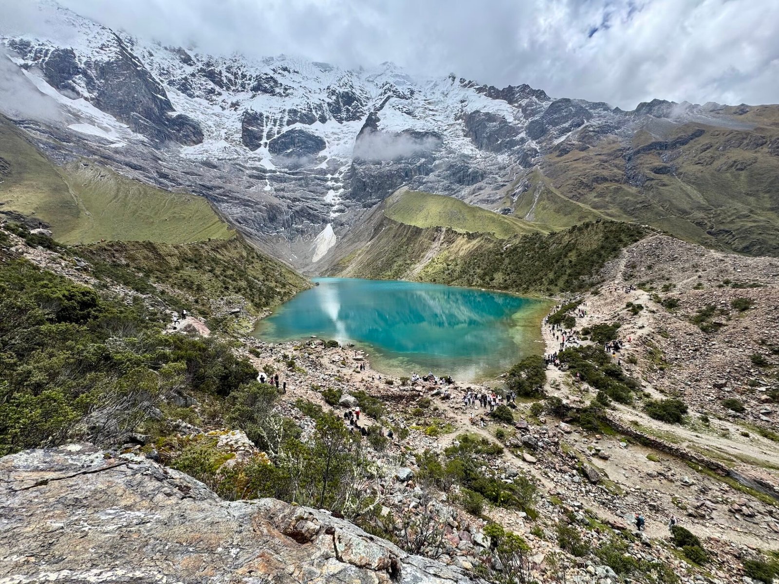 Bright blue Huamantay Lake surrounded by mountains