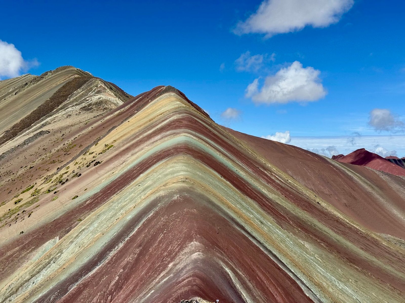 View of Rainbow Mountain from Vinicunca